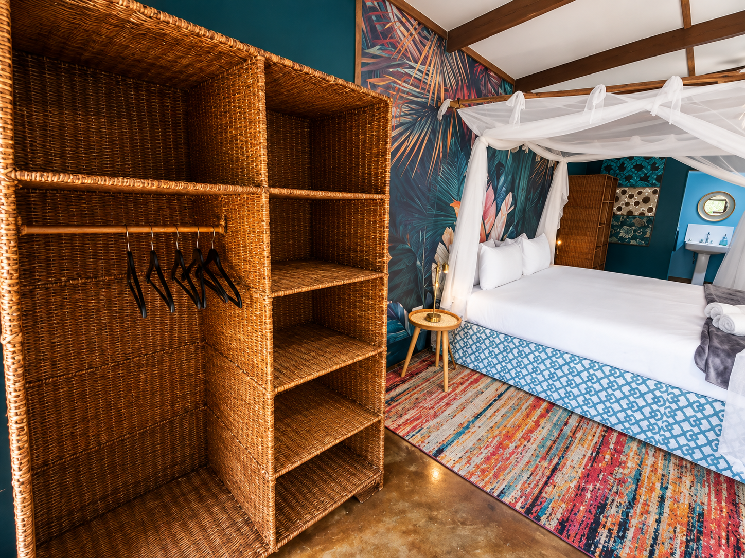 Bedroom storage and king-size bed in the Superior Deluxe Two Sleeper at Gala-Gala Eco Resort