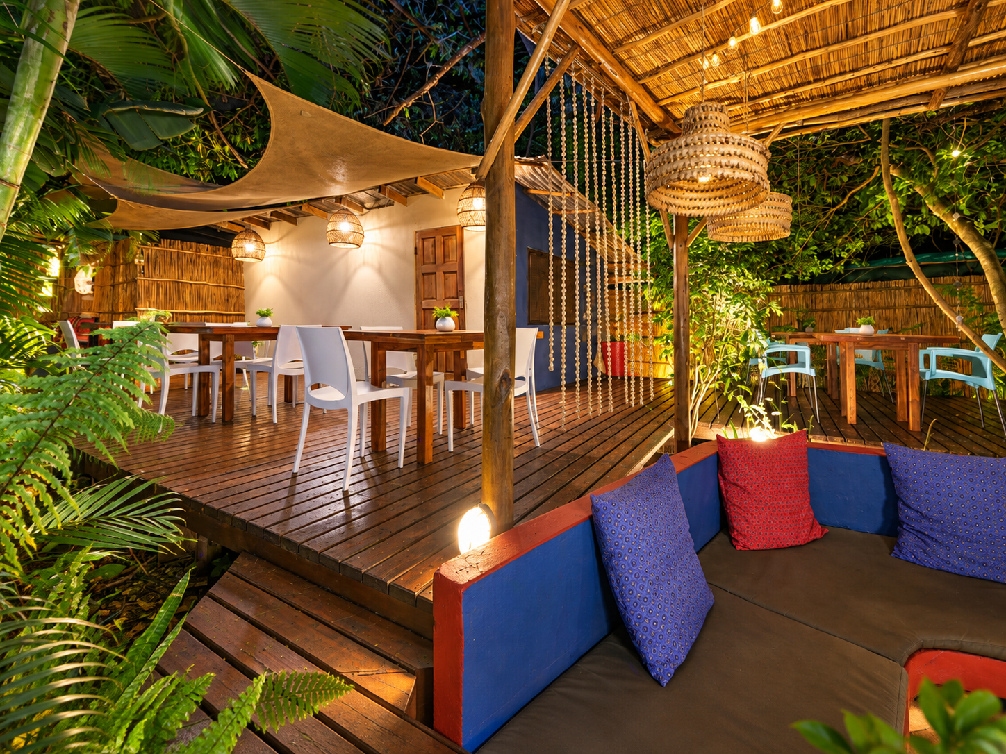 Blue Zebra Café seating in the tropical gardens at Gala-Gala Eco Resort